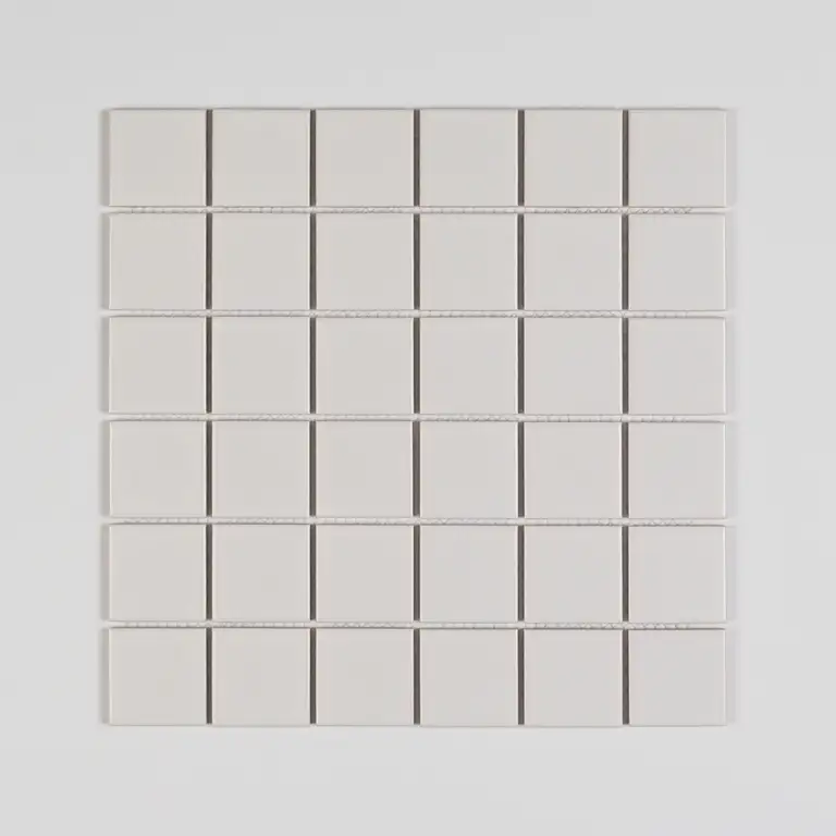 Professional product photo of square white ceramic tiles arranged in a grid pattern, captured under studio lighting by a Gold Coast product photographer for eCommerce catalogue use.