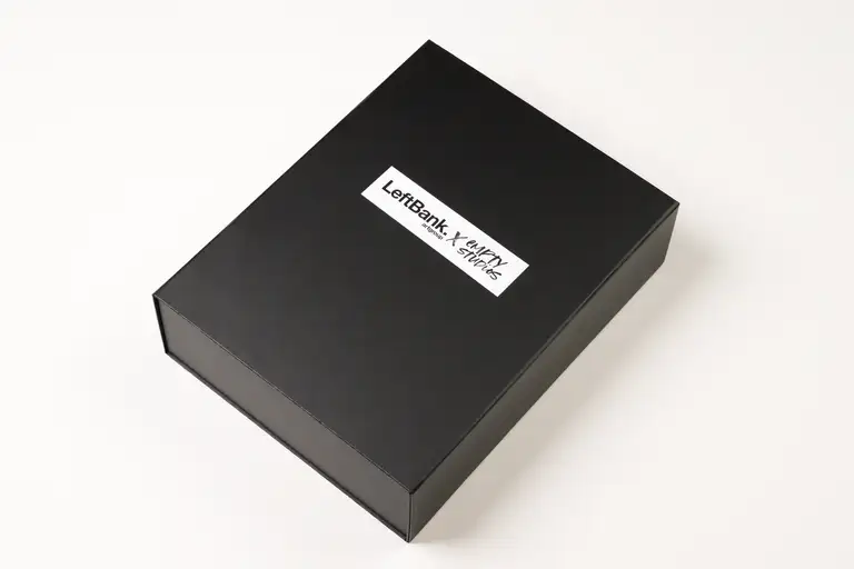 Studio photo of a black branded trade kit box for Left Bank Art Group and Empty Studios collaboration, photographed by a Gold Coast product photographer.